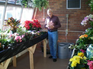 Norm Wente in the conservatory at Colonial Acres