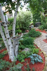 Bark and garden art offer other ways to add white to the garden. 