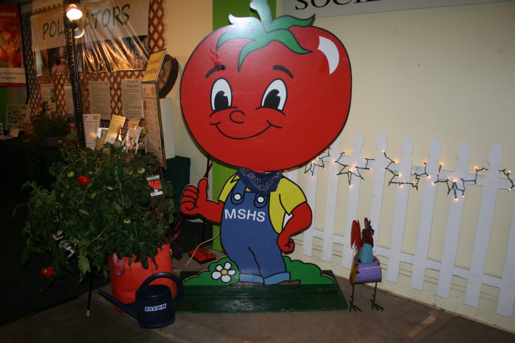 Our No. 1 volunteer -- Mr. Tomato Guy. He's always near our booth. 