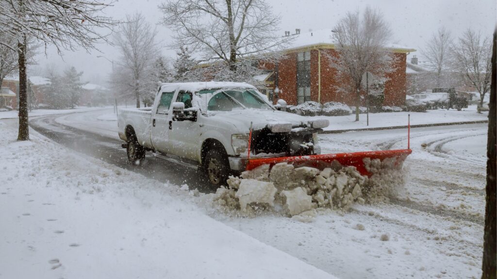 snow plow on roadway