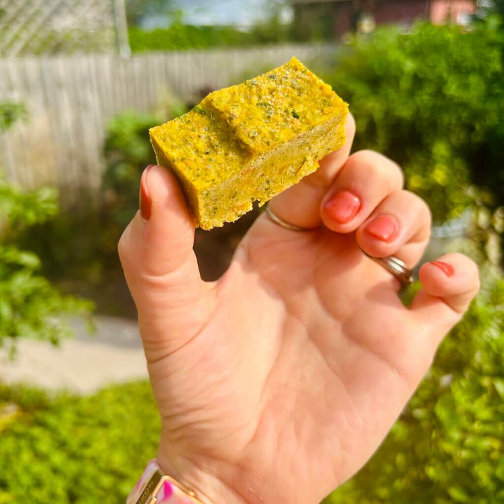Hand holding a finished vegetable bouillon cube
