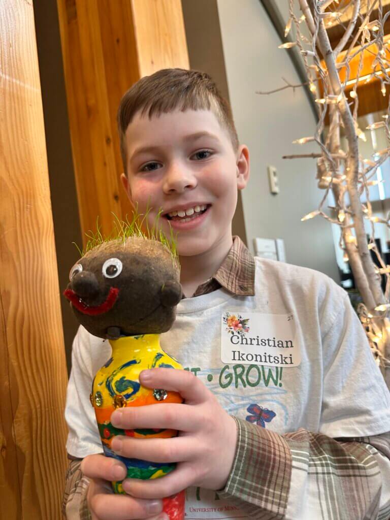 Christian Ikonitski with his friend, Jeremy the potato