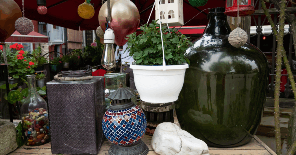 Garden pots and decorations being sold at a thrift store
